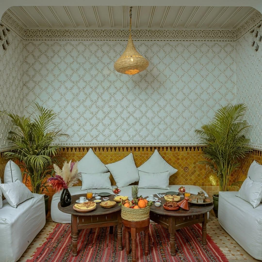 Handcrafted cedar wood details in a bedroom at Riad Darino heritage riad Marrakech